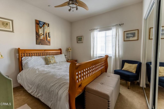 bedroom featuring light carpet