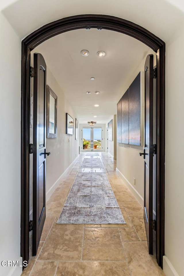 corridor featuring french doors