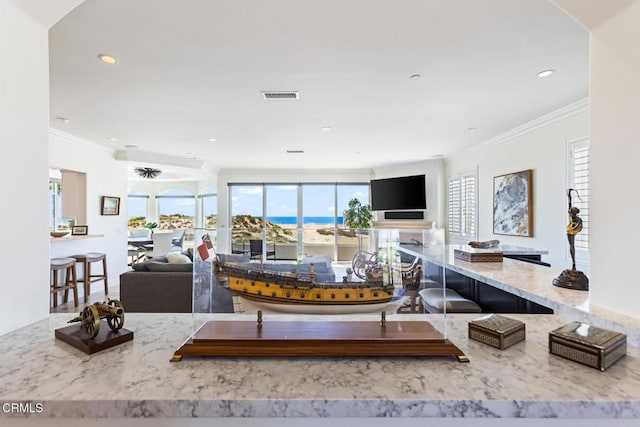 living room with crown molding