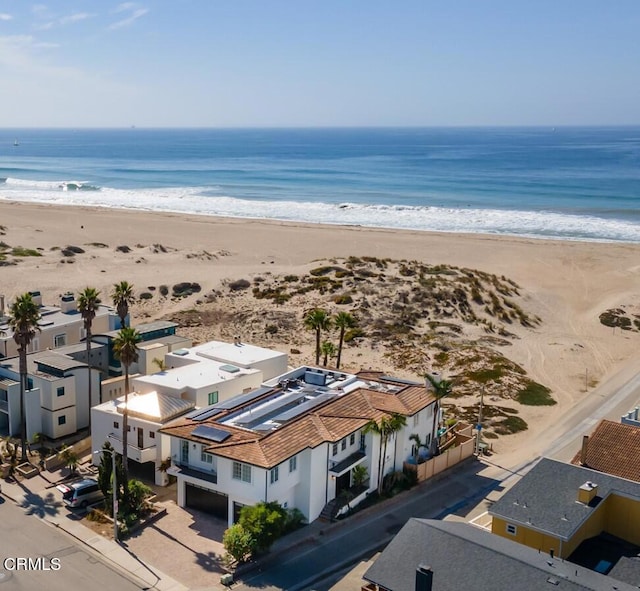 aerial view featuring a beach view and a water view