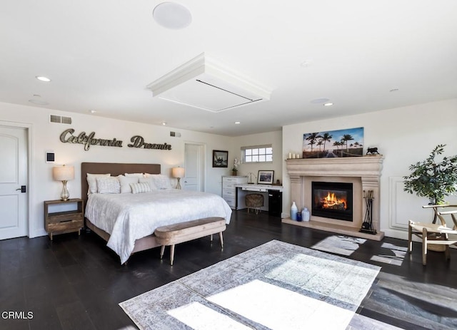 bedroom with dark wood-type flooring