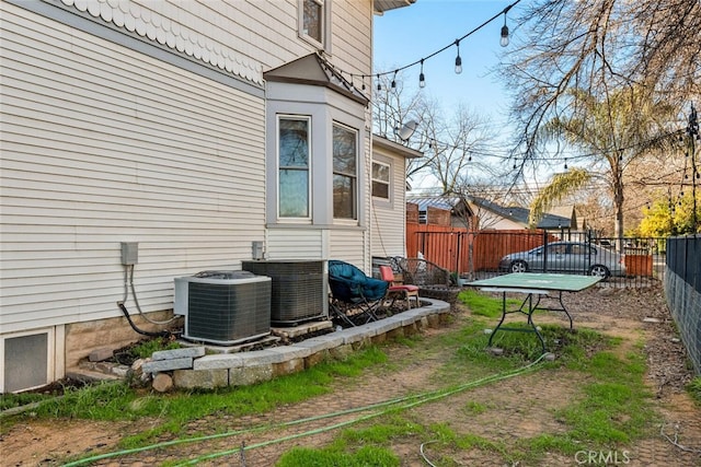 view of yard with central AC unit