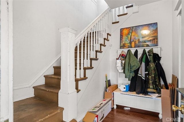 staircase featuring hardwood / wood-style flooring