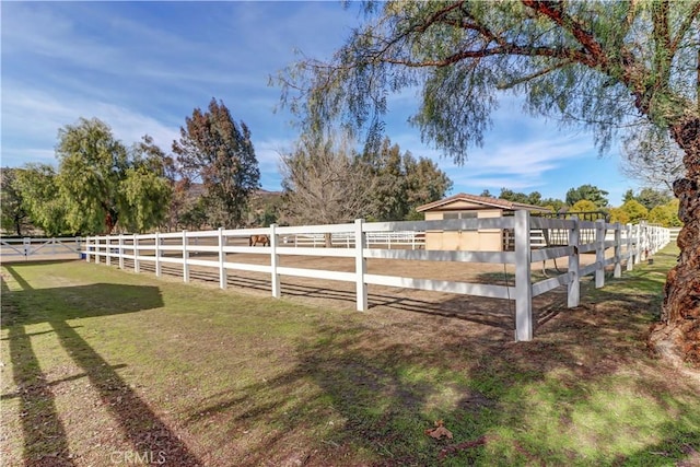 view of yard featuring an enclosed area and fence