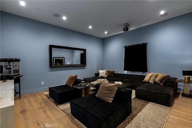 home theater featuring light hardwood / wood-style floors