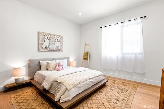 bedroom featuring hardwood / wood-style floors