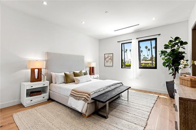 bedroom with light wood-type flooring