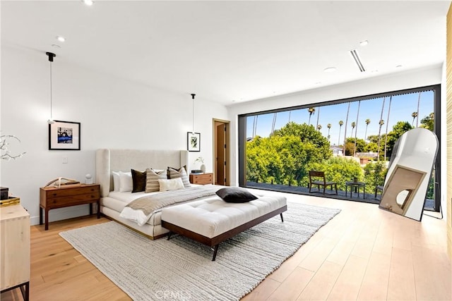 bedroom featuring light hardwood / wood-style floors