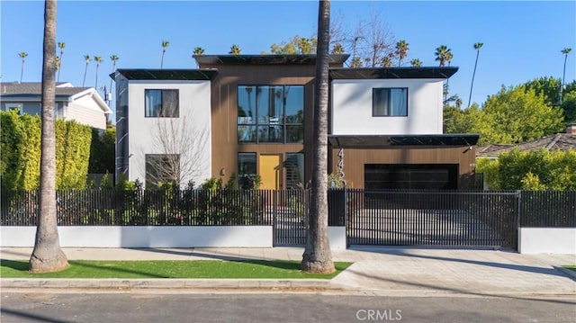 modern home featuring a garage