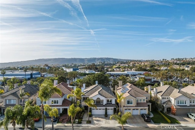 bird's eye view with a residential view and a mountain view