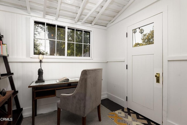 office area featuring vaulted ceiling with beams