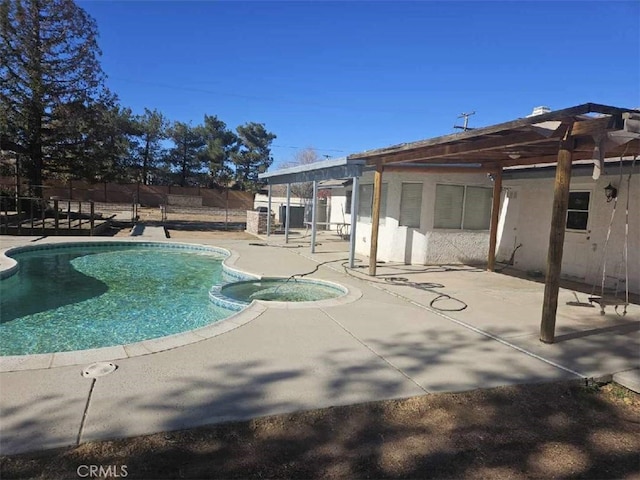 view of swimming pool featuring a pergola and a patio