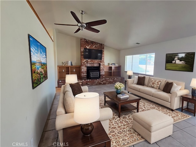 living area with lofted ceiling, tile patterned flooring, visible vents, and a ceiling fan