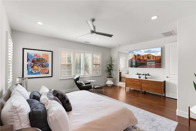 bedroom with dark wood-type flooring and ceiling fan