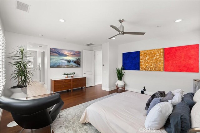 bedroom featuring wood-type flooring and ceiling fan