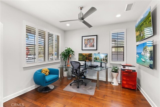 office space featuring hardwood / wood-style flooring and ceiling fan