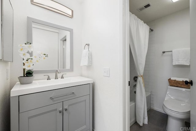 full bathroom with vanity, toilet, and shower / bath combo with shower curtain