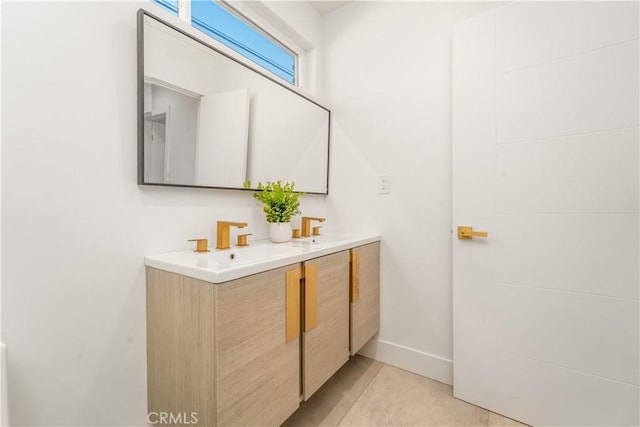 bathroom featuring tile patterned floors and vanity