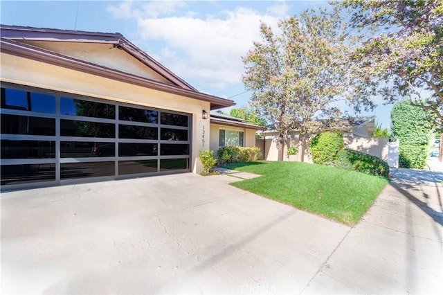 view of property exterior featuring a garage