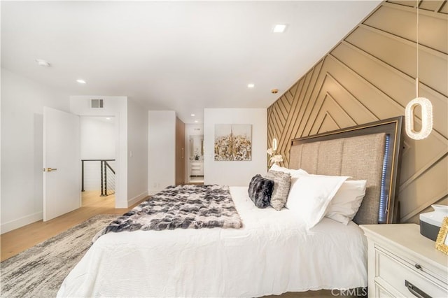 bedroom featuring light wood-type flooring