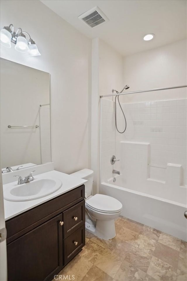 full bathroom featuring vanity, toilet, and tub / shower combination