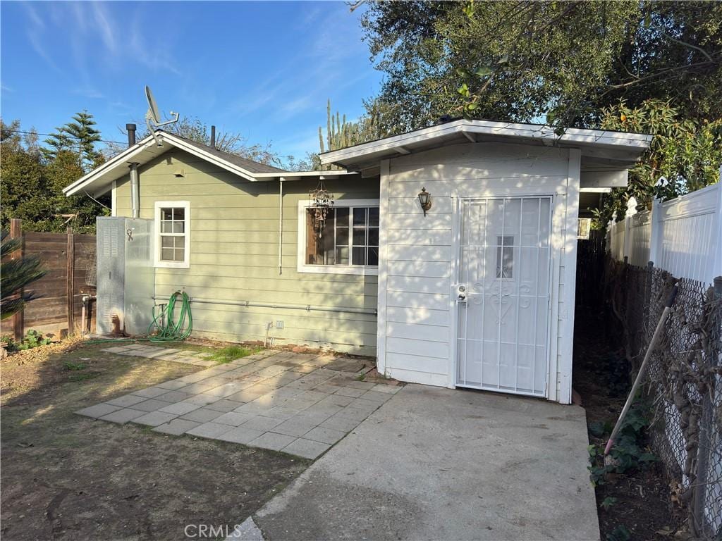 back of house featuring a patio area