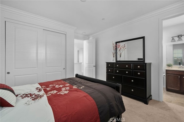 carpeted bedroom featuring connected bathroom, ornamental molding, and a closet