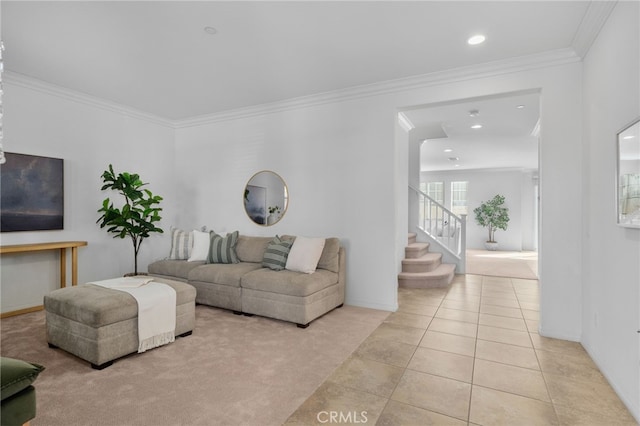 living room with light tile patterned flooring and crown molding