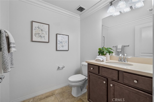 bathroom with crown molding, vanity, tile patterned floors, and toilet