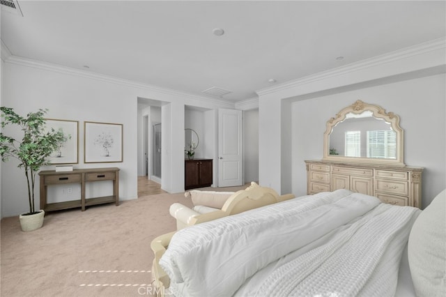 bedroom featuring ornamental molding, visible vents, and light carpet