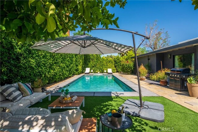 250 W Cortez Rd, Palm Springs, CA 92262 - view of pool featuring grilling area, an outdoor hangout area, a lawn, and a patio