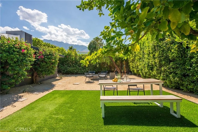 250 W Cortez Rd, Palm Springs, CA 92262 - view of grassy yard featuring a patio area and a mountain view