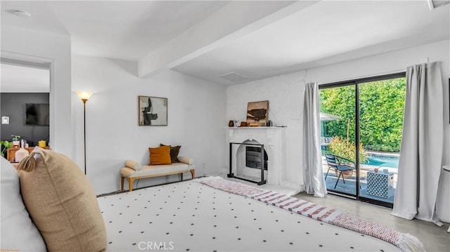 250 W Cortez Rd, Palm Springs, CA 92262 - living room with beam ceiling and a glass covered fireplace
