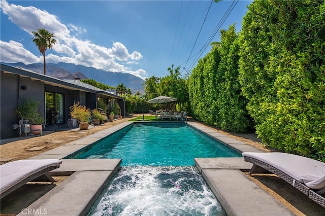 250 W Cortez Rd, Palm Springs, CA 92262 - outdoor pool featuring a mountain view and an in-ground hot tub
