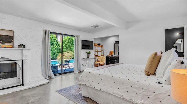 250 W Cortez Rd, Palm Springs, CA 92262 - bedroom featuring finished concrete floors, access to outside, and beam ceiling