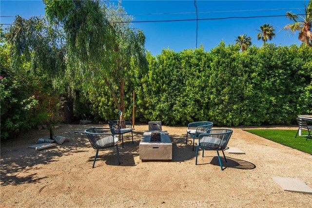 250 W Cortez Rd, Palm Springs, CA 92262 - view of patio with a fire pit
