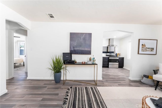 living room with dark hardwood / wood-style floors