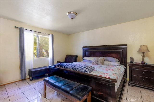 bedroom featuring light tile patterned flooring