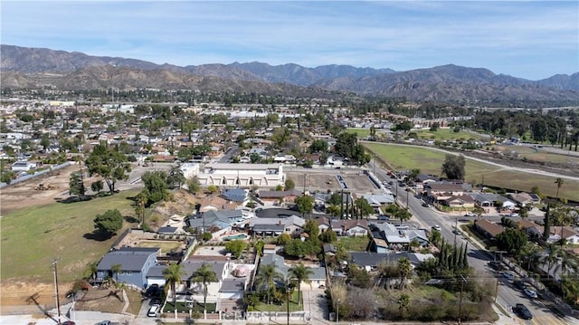 bird's eye view featuring a residential view and a mountain view