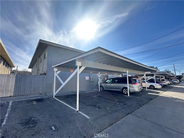 view of parking with a carport