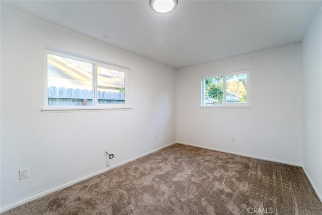 view of carpeted spare room