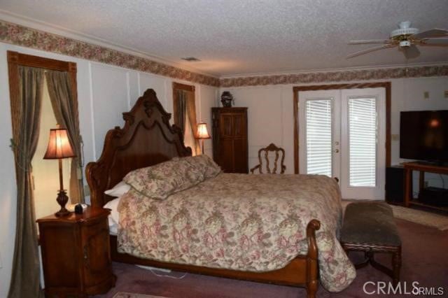 bedroom with dark colored carpet, crown molding, a textured ceiling, and french doors