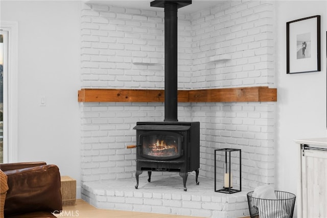 interior details featuring a wood stove