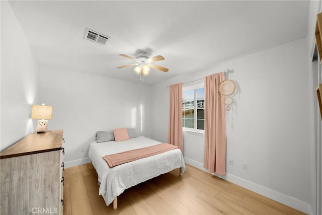 bedroom featuring ceiling fan and light wood-type flooring