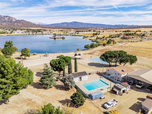 bird's eye view featuring a water and mountain view