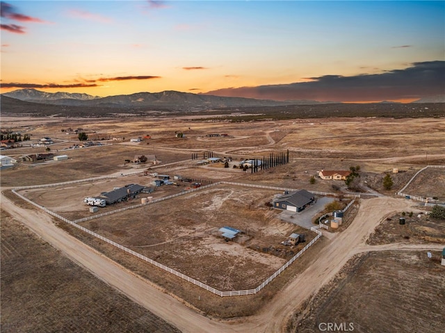 aerial view at dusk with a mountain view