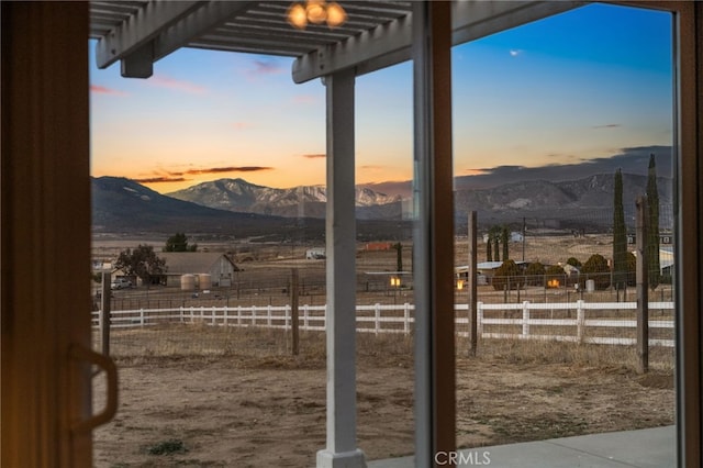 exterior space featuring a mountain view and a rural view