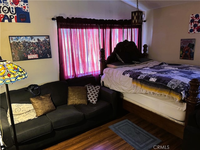 bedroom featuring wood-type flooring