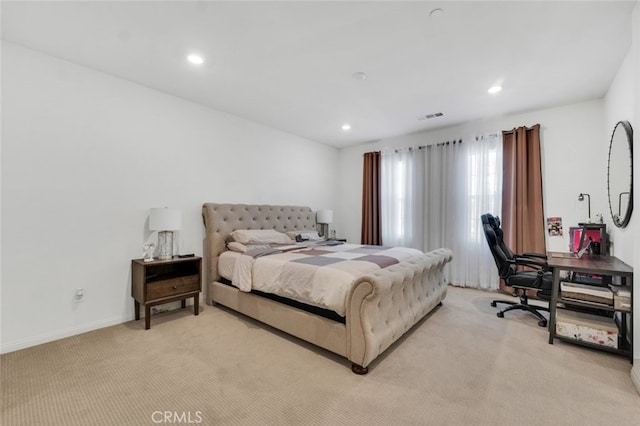 bedroom with light carpet, baseboards, visible vents, and recessed lighting