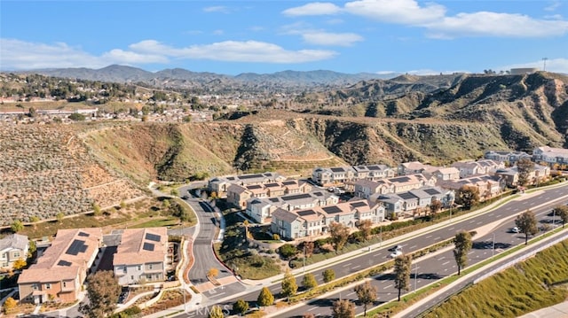 birds eye view of property with a residential view and a mountain view